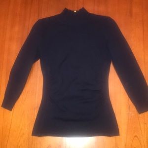 Waist defining navy blue turtleneck